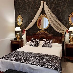 Kamer met een Queen Size Bed